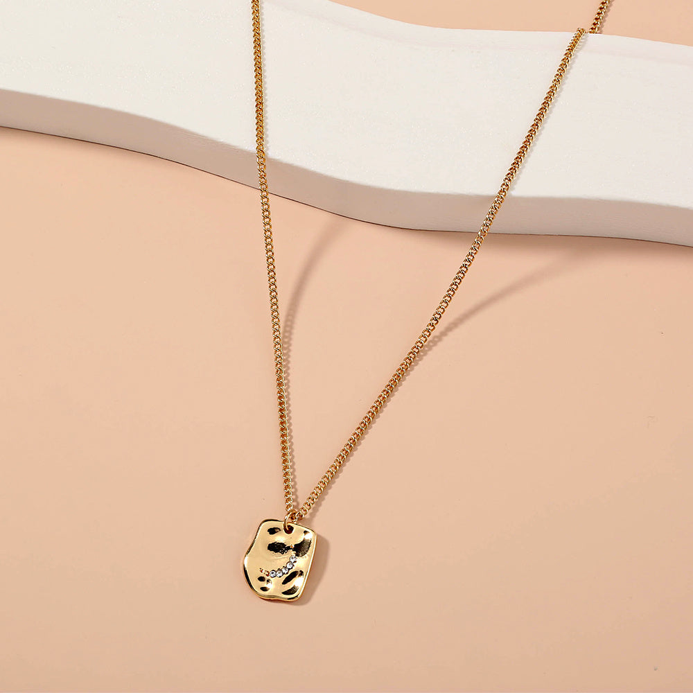 Irregular tag necklace with diamond inlay