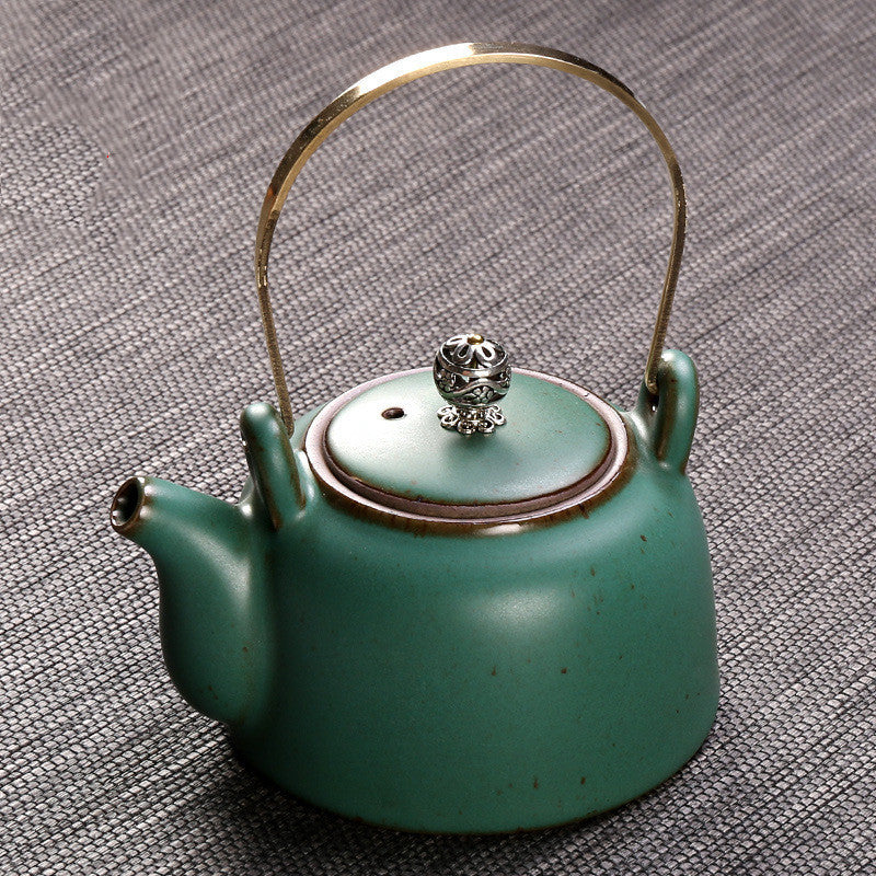Théière antique, poignée, pot en céramique, machine à thé rétro, poignée en cuivre domestique