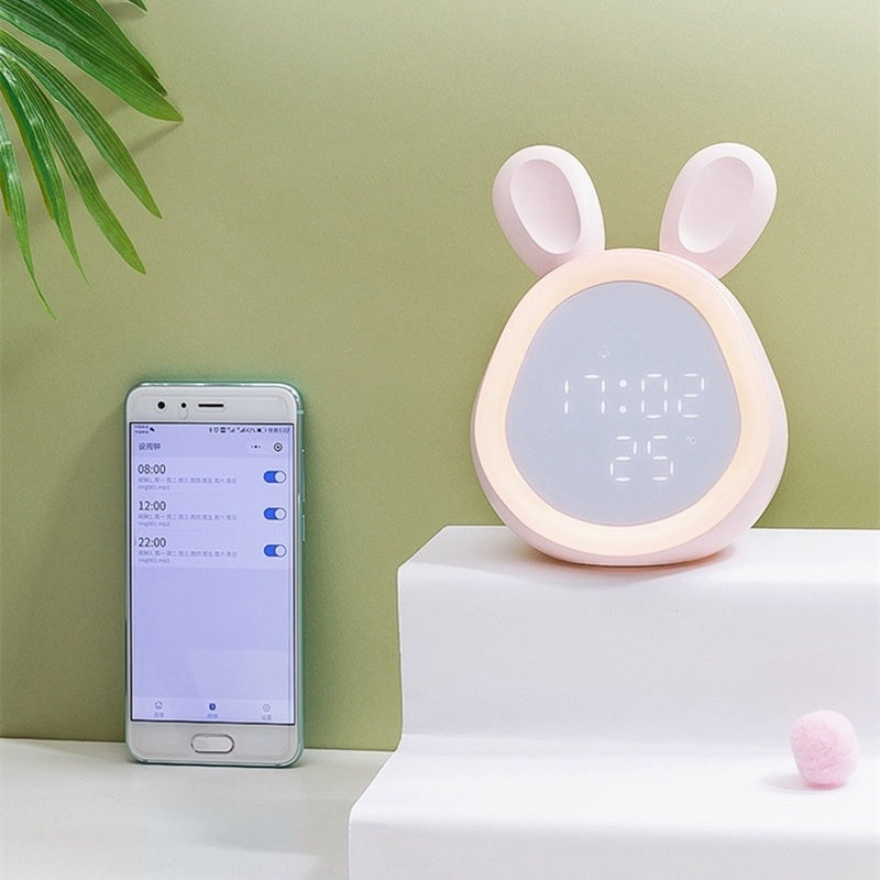 Electronic small alarm clock students use charging