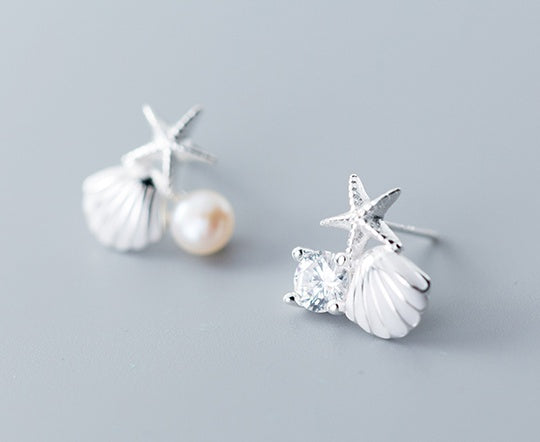 Boucles d'oreilles étoiles et coquillages