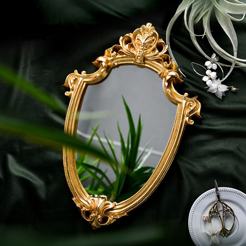 Vintage old golden embossed hollow makeup mirror