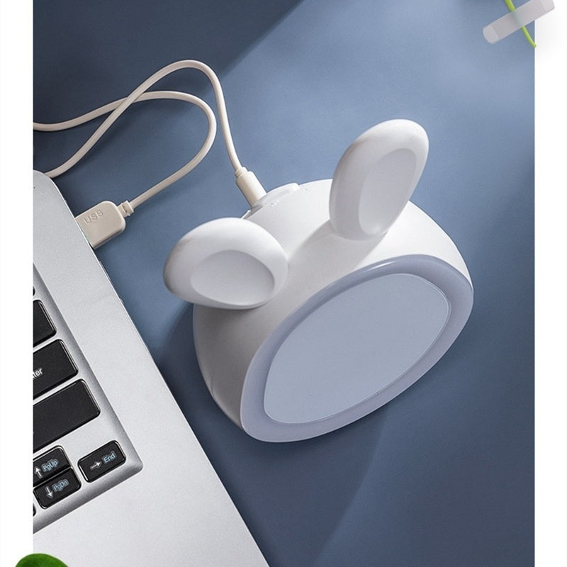 Electronic small alarm clock students use charging