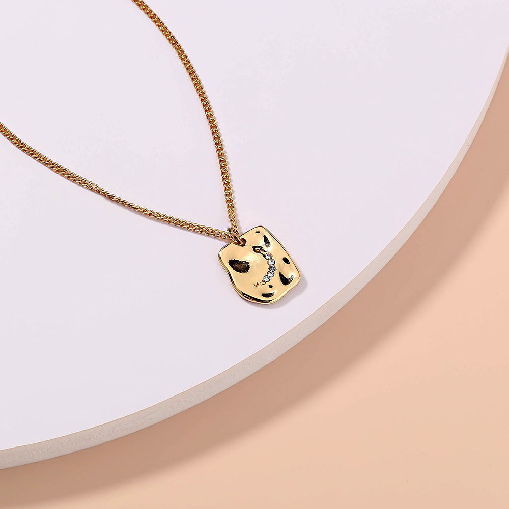 Irregular tag necklace with diamond inlay