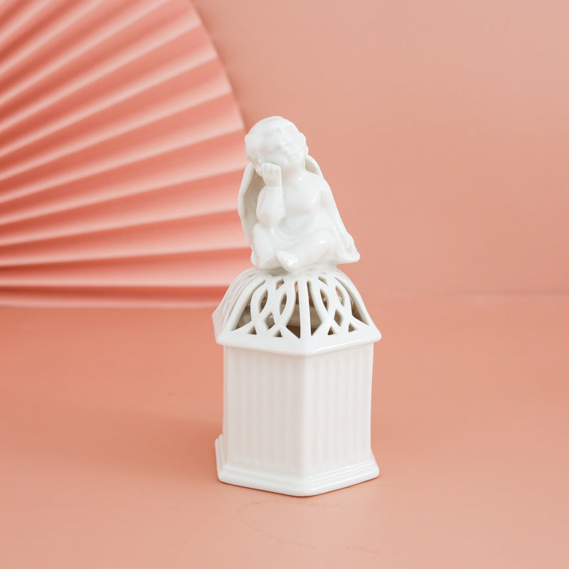 Porte-bougie creux petit ange