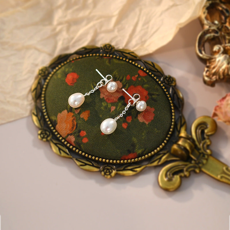 Freshwater Pearl Earrings Are Worn By Women For Two