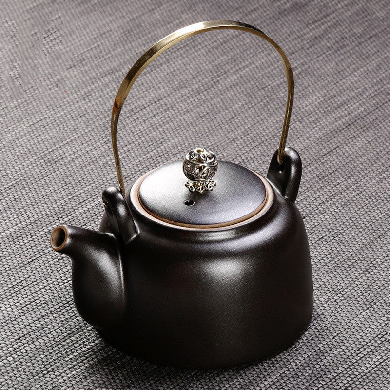 Théière antique, poignée, pot en céramique, machine à thé rétro, poignée en cuivre domestique