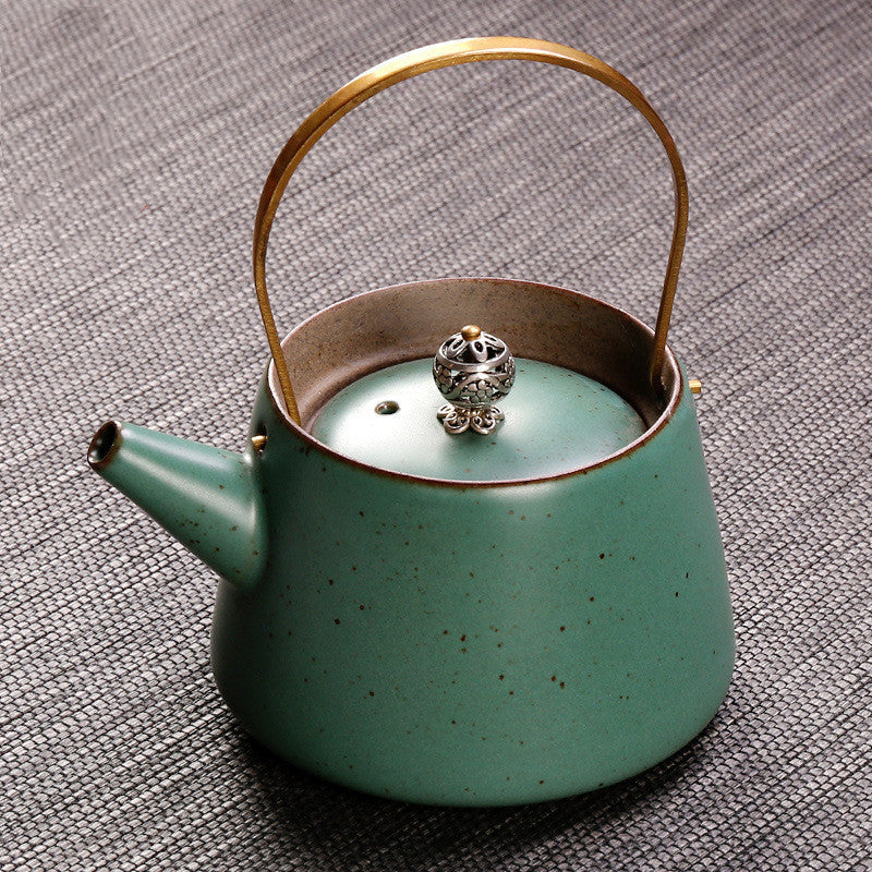 Théière antique, poignée, pot en céramique, machine à thé rétro, poignée en cuivre domestique