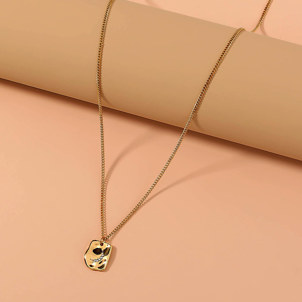 Irregular tag necklace with diamond inlay