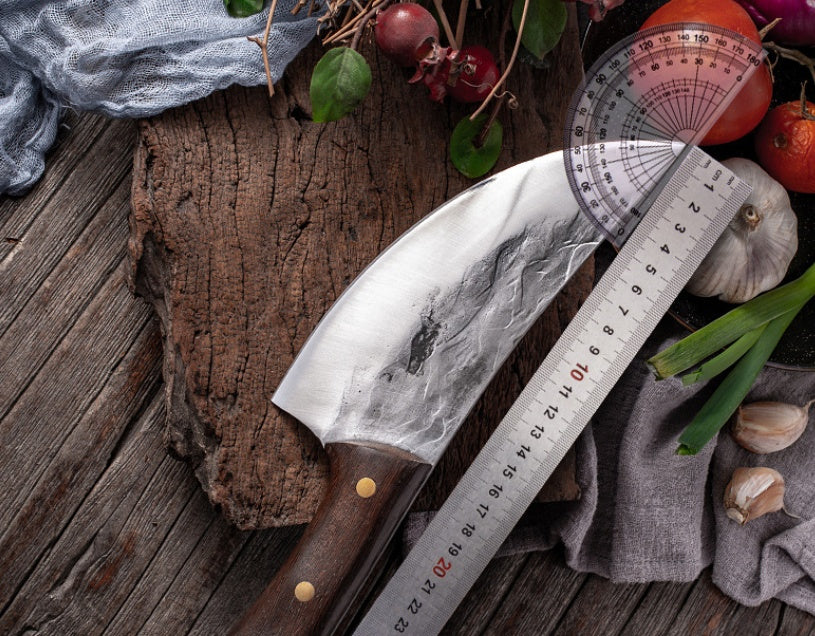 Cutting Meat With Carbon Steel Butcher Knife