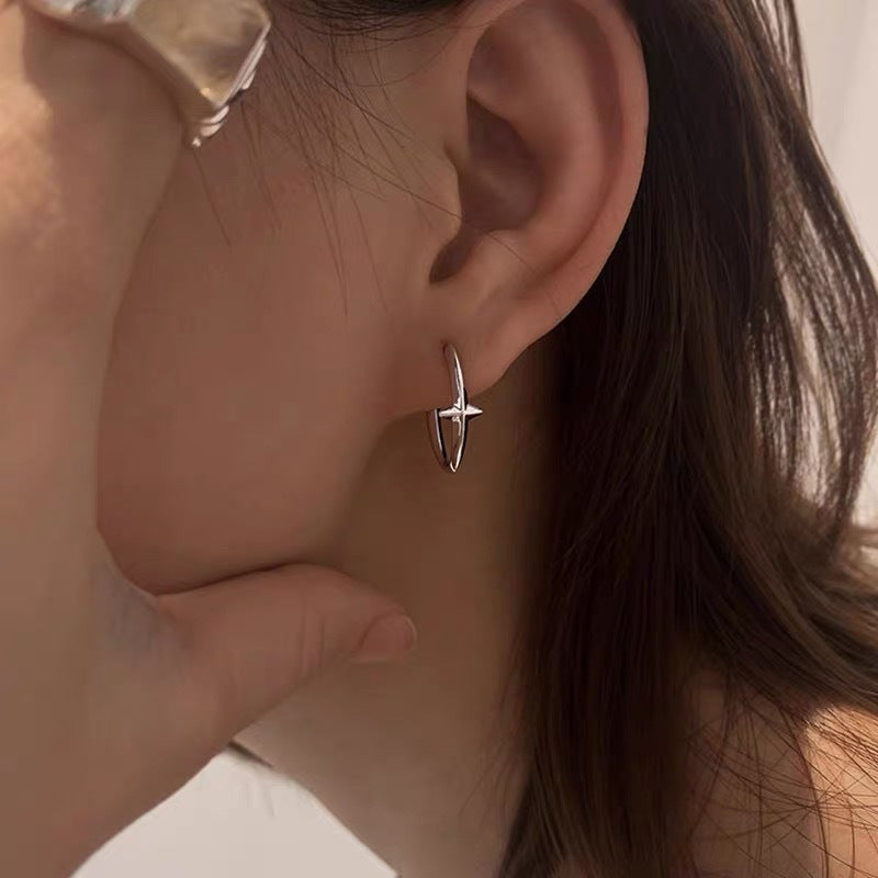Minimally Designed Metal Star Shaped Earrings