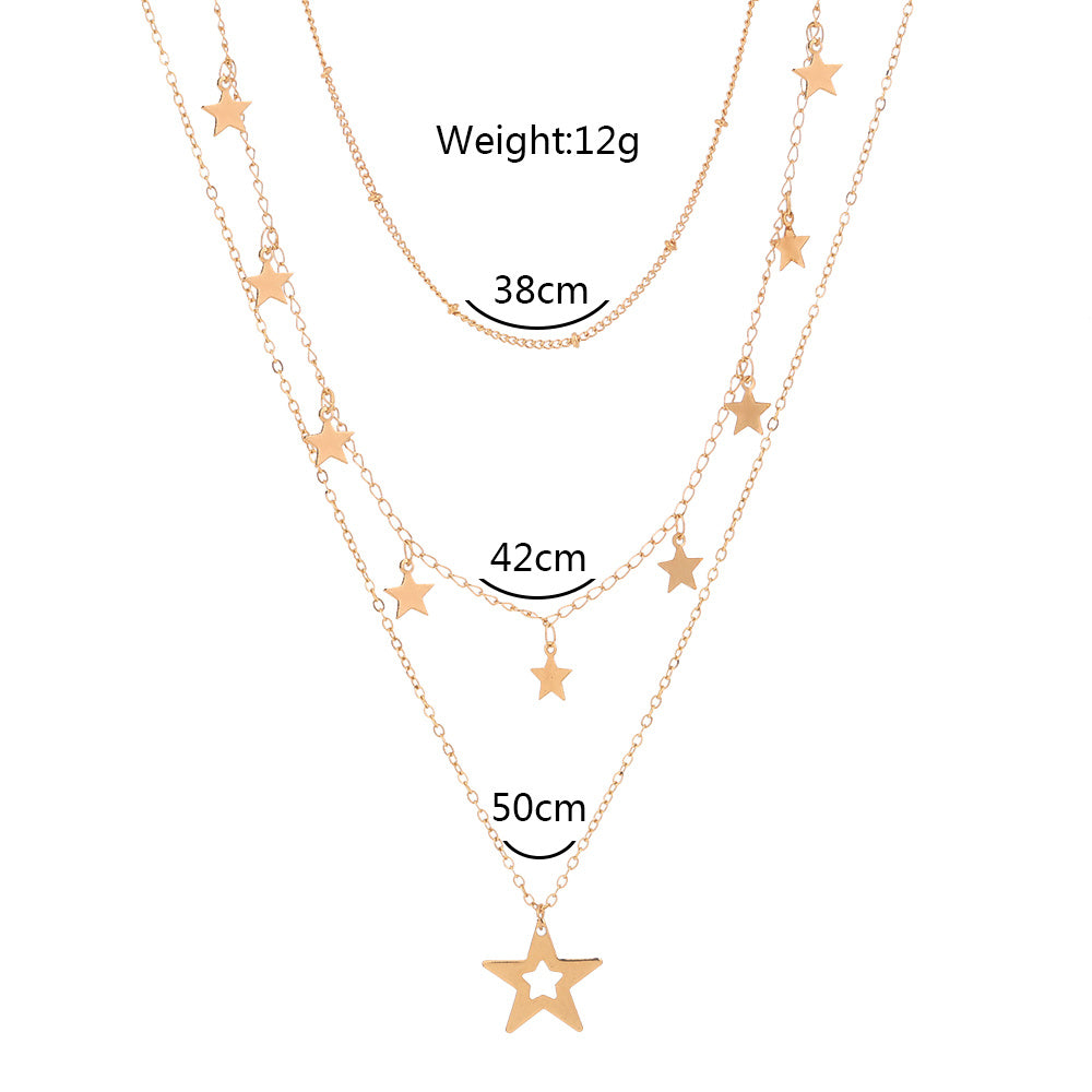 Collier multirang avec pendentif pompon étoile