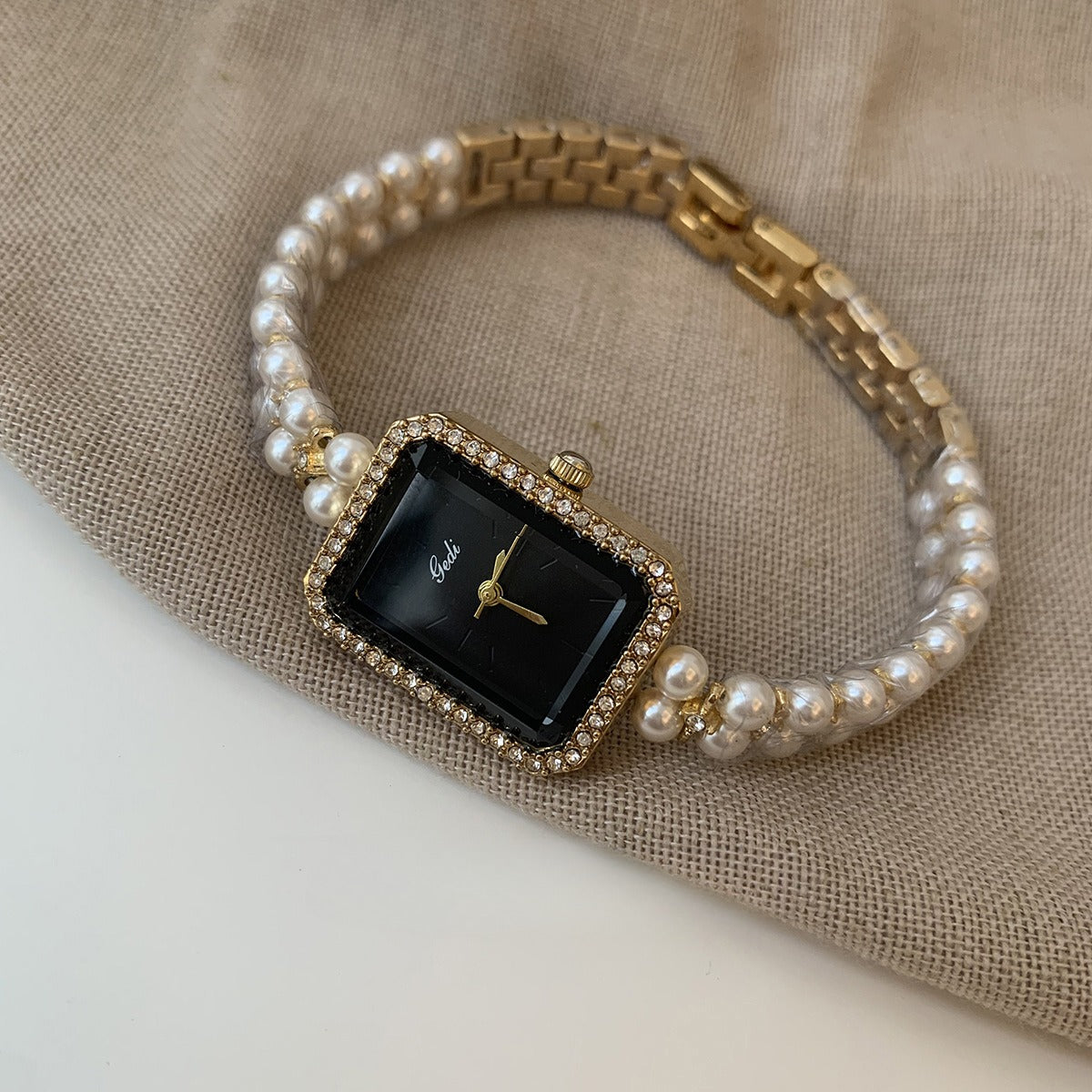 Montre à quartz tendance avec bracelet perles carrées, argent et noir, et diamants